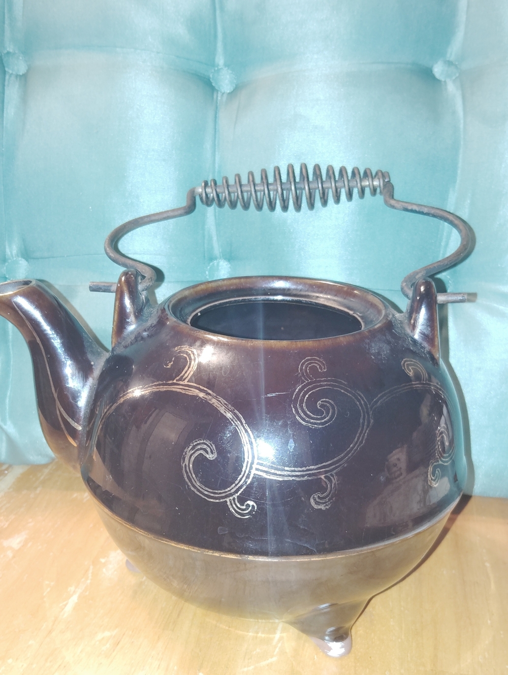 Brown Ceramic Teapot with Swirl Design and Metal Handle